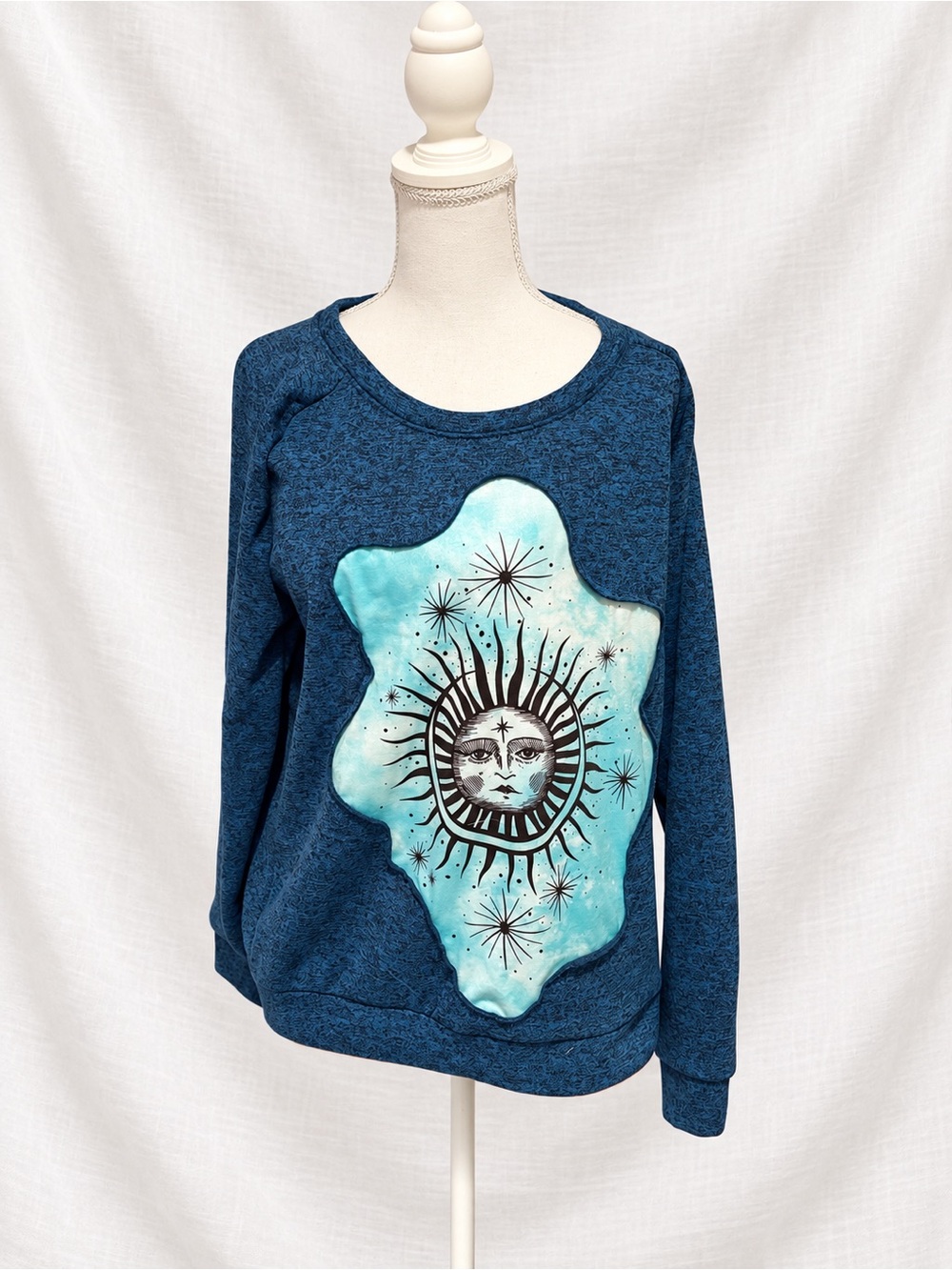 PM Athletics Women’s Celestial Sun Graphic Sweatshirt Blue